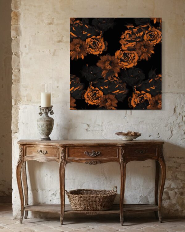 Antique-style room featuring a framed artwork of copper and black flowers hanging above a vintage wooden console table.