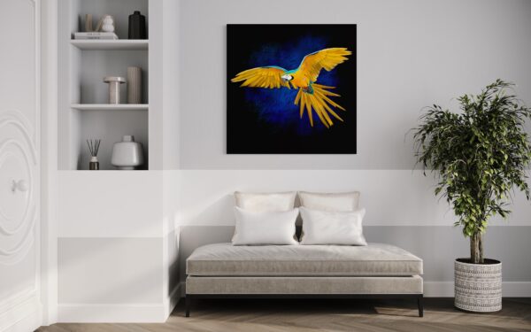Framed macaw artwork in a neutral-toned bed room, showcasing a vibrant yellow and blue macaw set against a textured blue background.
